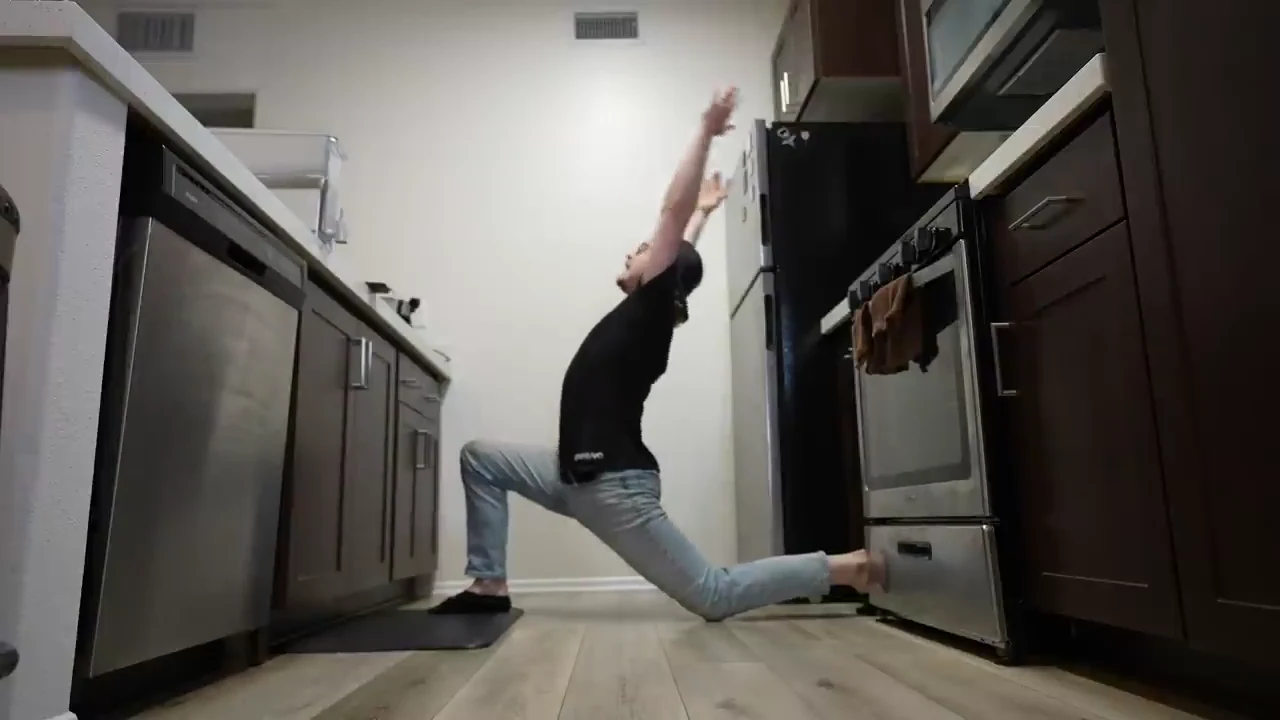 Hip-flexor lunge with a full overhead side reach
