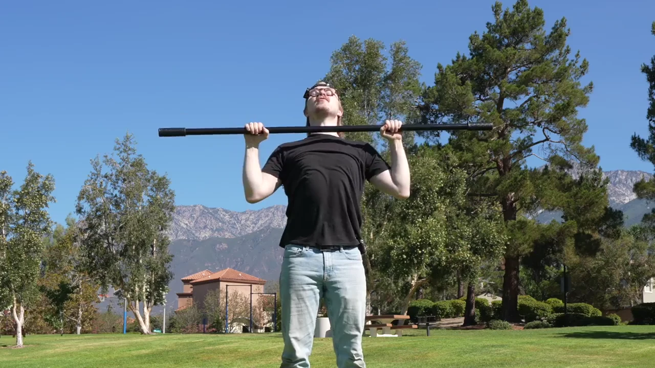 Wide-grip jack chest stretch setup with a long pole