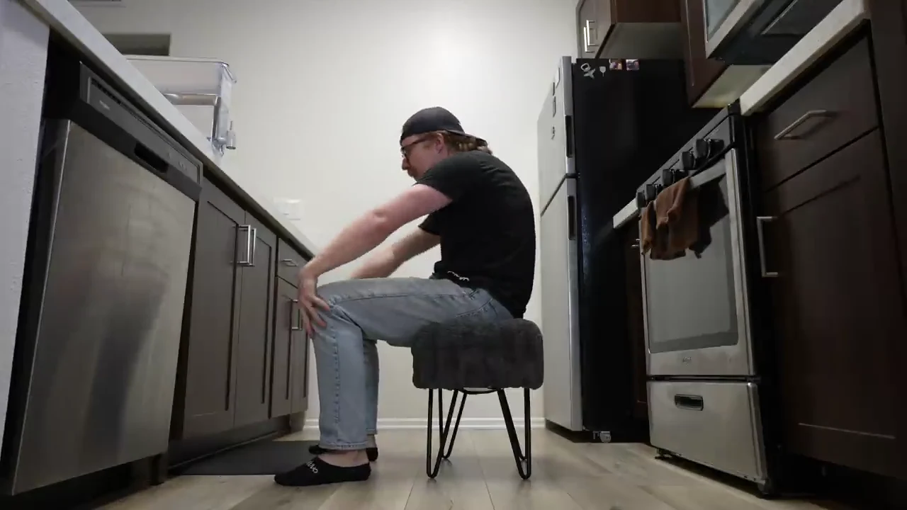 Easy seated chair-supported lat stretch